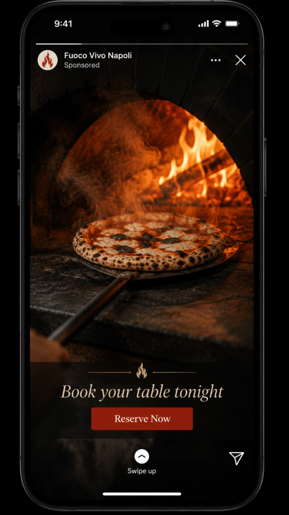 Fuoco Vivo Instagram Stories ad on iPhone showing pizza being pulled from wood-fired oven with dramatic flames and smoke with Reserve Now CTA button overlay